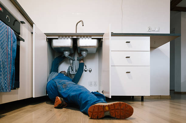 Professional Drain Cleaning technician working in Tow, TX